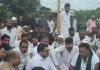 बिजनौर: एनएचआई 34 पर कट की मांग को लेकर भाकियू का धरना, प्रशासन के आश्वासन पर समाप्त
