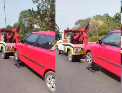 कार को क्रेन से उठाया, खतरे में आई अंदर बैठे बुजुर्ग की जिंदगी, ठेकेदार के खिलाफ कार्रवाई