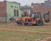 अमरोहा में प्रशासन की बड़ी कार्रवाई! अवैध प्लाटिंग पर चला बुलडोज़र, कई प्लॉट जमींदोज़